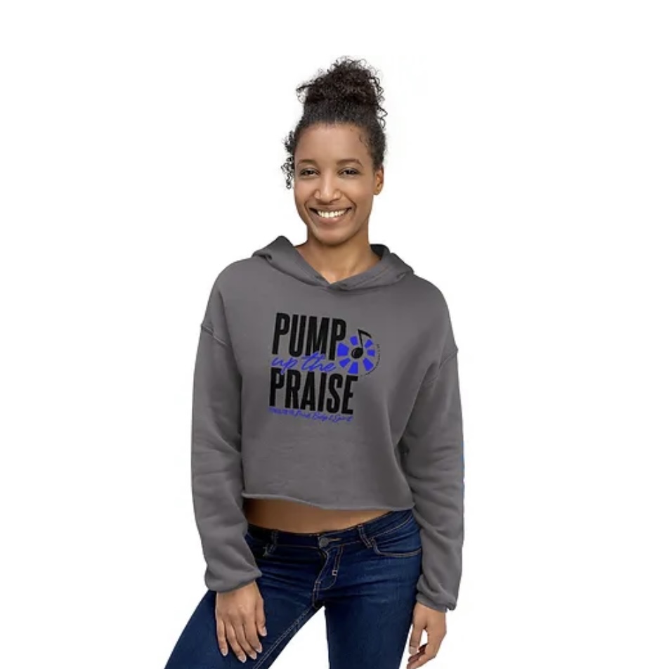 Gray cropped Pump Up The Praise hoodie worn by a woman